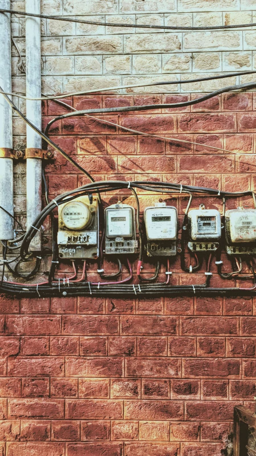 Row of electricity meters used for utility billing in Pakistan