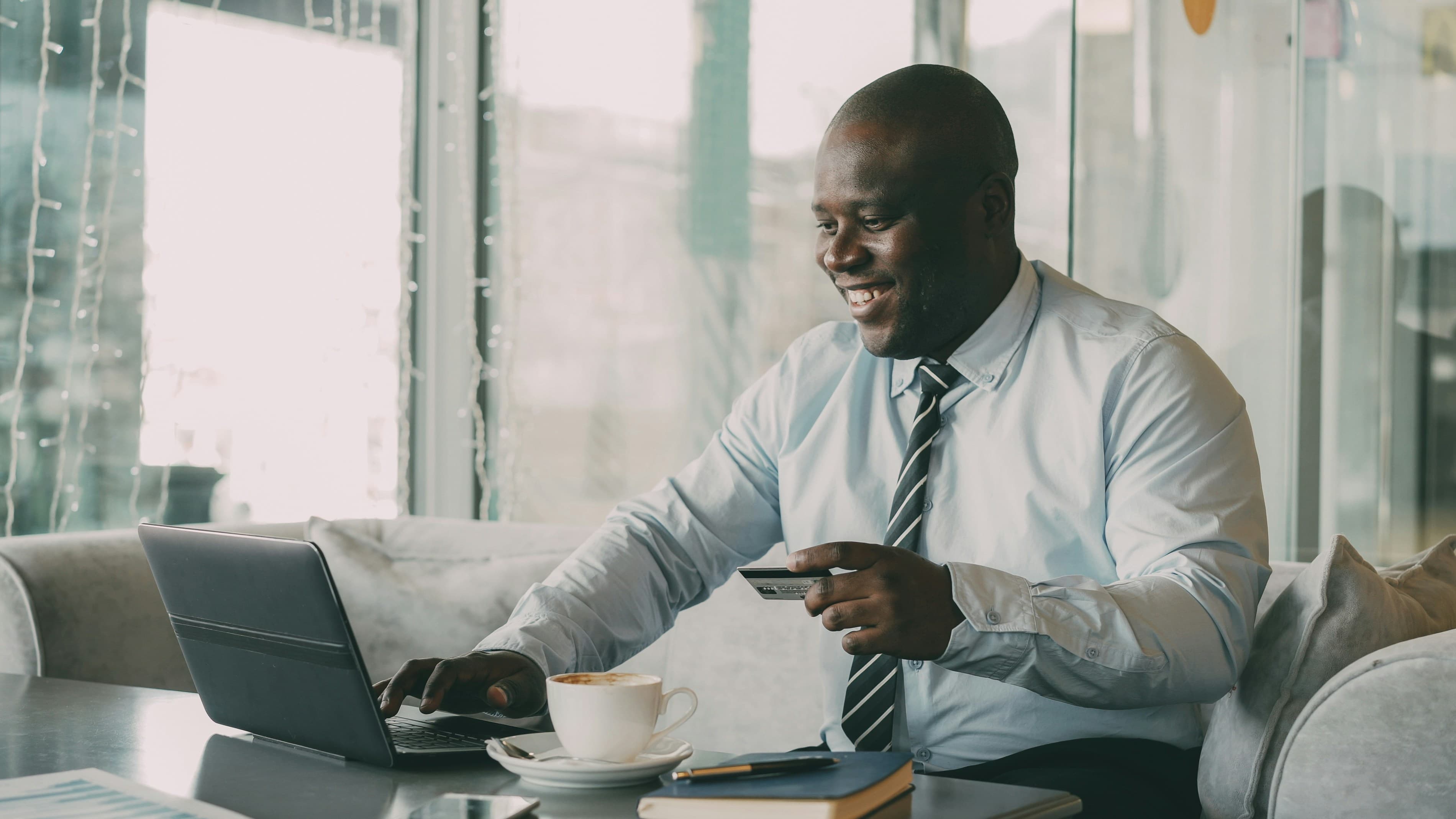 Person using a laptop for a secure online payment